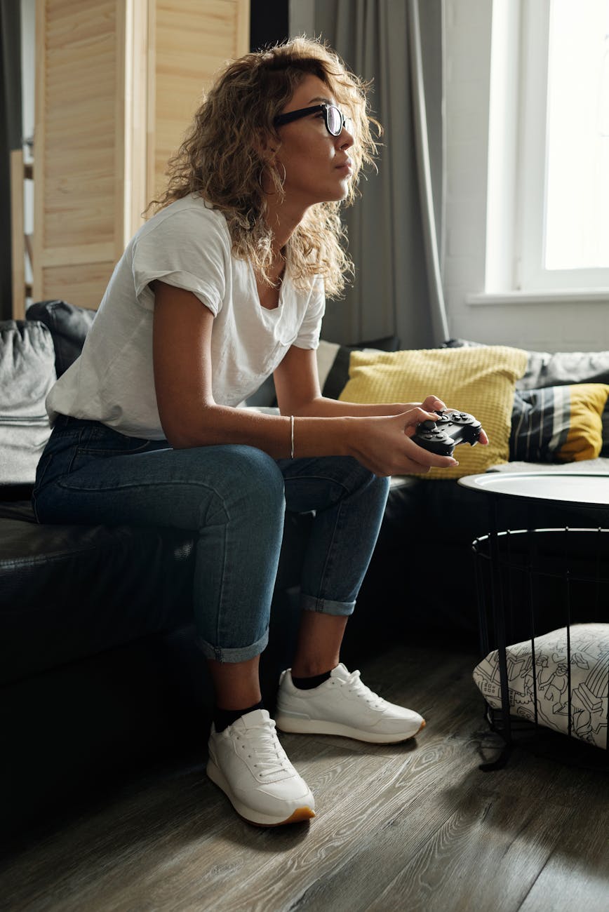 photo of woman sitting on couch